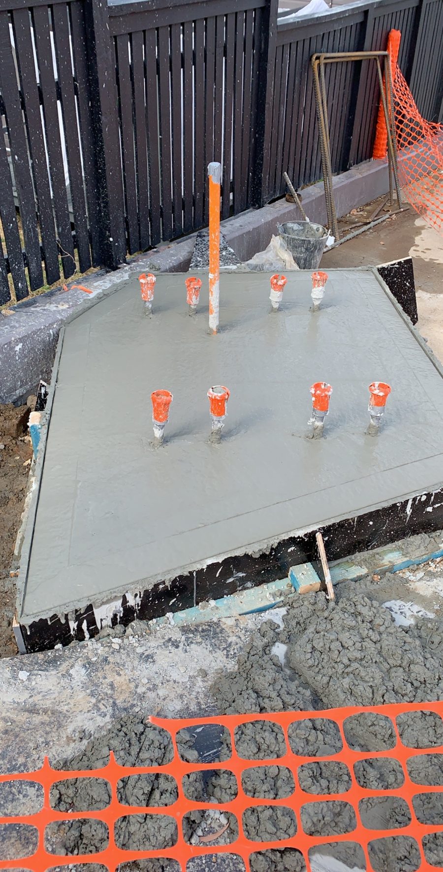 Engineered footing with anchor bolt template, ready for structure install