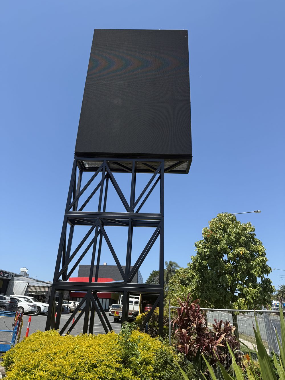 Large-format LED spectacular structure on a lattice tower base